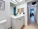 Stylish bathroom with modern vanity and floating shelves at 2058 Sheffield Ct, Oldsmar, FL 34677