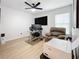 Bright home office with built-in workspace and comfortable seating at 2058 Sheffield Ct, Oldsmar, FL 34677