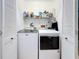 Convenient laundry room with washer and dryer at 2058 Sheffield Ct, Oldsmar, FL 34677