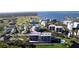 Aerial view showcasing condo building and surrounding area at 220 Belleview Blvd # 609, Belleair, FL 33756