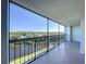 Relaxing balcony overlooking tranquil waters and lush greenery at 220 Belleview Blvd # 609, Belleair, FL 33756