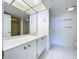 Clean bathroom with double vanity and shower at 220 Belleview Blvd # 609, Belleair, FL 33756