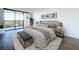 Spacious bedroom with hardwood floors and a private balcony at 220 Belleview Blvd # 609, Belleair, FL 33756