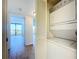 Stackable washer and dryer in a well-lit laundry closet at 220 Belleview Blvd # 609, Belleair, FL 33756