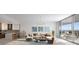 Open concept living area with modern furniture and city views at 235 1St S Ave # 2504, St Petersburg, FL 33701