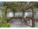 Relaxing backyard patio with pergola, seating, and brick pavers at 236 9Th Ne Ave, St Petersburg, FL 33701