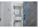 Modern bathroom with barn door and subway tile at 236 9Th Ne Ave, St Petersburg, FL 33701