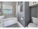 Bathroom with toilet and shower/tub combo at 236 9Th Ne Ave, St Petersburg, FL 33701