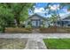 Quaint house with picket fence and a stone walkway at 236 9Th Ne Ave, St Petersburg, FL 33701