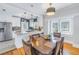 Modern kitchen features white cabinets, granite counters, and stainless steel appliances at 236 9Th Ne Ave, St Petersburg, FL 33701