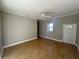 Bright living room with hardwood floors and neutral walls at 3040 Sheppards Crook Ct, Holiday, FL 34691