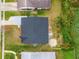 Directly above view of home showcasing the roof and landscaping at 3145 Covina St, New Port Richey, FL 34655