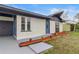 Modern exterior featuring gray and white color scheme at 3145 Covina St, New Port Richey, FL 34655