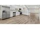 Modern kitchen with white cabinets and stainless steel appliances at 3145 Covina St, New Port Richey, FL 34655