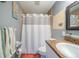 Clean bathroom with shower/tub combo and granite vanity at 3645 Lokai Pl, Sarasota, FL 34232