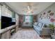 Comfortable living room with sectional sofa and decorative wall art at 3645 Lokai Pl, Sarasota, FL 34232