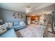 Open living room and kitchen with a comfortable seating area at 3645 Lokai Pl, Sarasota, FL 34232