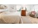 Relaxing bedroom with a plush bed and ample floor space at 37318 Lois Ave, Zephyrhills, FL 33542
