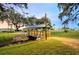 Charming footbridge over waterway in a residential community at 37318 Lois Ave, Zephyrhills, FL 33542