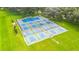 Aerial view of community pickleball and tennis courts at 37318 Lois Ave, Zephyrhills, FL 33542