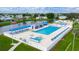 Community pool with plenty of lounge chairs at 37318 Lois Ave, Zephyrhills, FL 33542