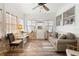 Sunroom with seating area and access to backyard at 37318 Lois Ave, Zephyrhills, FL 33542