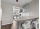 Modern kitchen with granite countertops and gray cabinets at 4550 Overlook Ne Dr # 258, St Petersburg, FL 33703