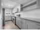 Gray kitchen with white subway tile backsplash and stainless steel appliances at 4550 Overlook Ne Dr # 258, St Petersburg, FL 33703