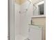 Simple bathroom with shower and white vanity at 5135 River Point Ct, New Port Richey, FL 34653