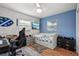 Bedroom with twin bed and workspace setup at 5135 River Point Ct, New Port Richey, FL 34653