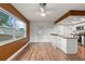 Eat-in kitchen with breakfast bar and view to backyard at 5135 River Point Ct, New Port Richey, FL 34653