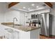 Modern kitchen with granite countertops and stainless steel appliances at 5135 River Point Ct, New Port Richey, FL 34653