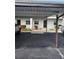 Covered parking spot in front of condo building at 5197 Silent Loop # 121, New Port Richey, FL 34652