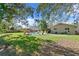 Expansive backyard featuring a kidney-shaped pool at 5265 Venetian Ne Blvd, St Petersburg, FL 33703