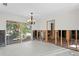 Dining room with water damage and needs renovation at 5265 Venetian Ne Blvd, St Petersburg, FL 33703