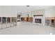 Living room with stone fireplace, currently under reconstruction at 5265 Venetian Ne Blvd, St Petersburg, FL 33703