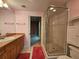 Bathroom with a shower and updated vanity at 555 5Th Ne Ave # 521, St Petersburg, FL 33701