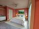 Serene bedroom with a king-size bed and built-in shelving at 555 5Th Ne Ave # 521, St Petersburg, FL 33701