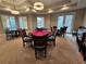 Game room with card table and comfortable seating at 555 5Th Ne Ave # 521, St Petersburg, FL 33701