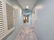 Light and airy hallway with tile floors and access to elevator at 555 5Th Ne Ave # 521, St Petersburg, FL 33701