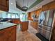Gourmet kitchen featuring granite countertops and stainless steel appliances at 555 5Th Ne Ave # 521, St Petersburg, FL 33701