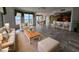 Spacious living room with water views, hardwood floors, and ample natural light at 555 5Th Ne Ave # 521, St Petersburg, FL 33701