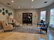 Lobby with comfortable seating, large windows and decorative artwork at 555 5Th Ne Ave # 521, St Petersburg, FL 33701