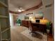 Home office with built-in shelving and a comfortable work area at 555 5Th Ne Ave # 521, St Petersburg, FL 33701