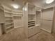 Spacious walk-in closet with ample shelving and hanging space at 555 5Th Ne Ave # 521, St Petersburg, FL 33701