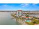 Aerial view of waterfront community with pool, dock, and multiple buildings at 6287 Bahia Del Mar Cir # 208, St Petersburg, FL 33715