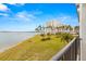 Spacious balcony overlooking the water and landscaped grounds at 6287 Bahia Del Mar Cir # 208, St Petersburg, FL 33715