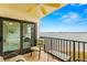Balcony with seating and partial bedroom view, plus water views at 6287 Bahia Del Mar Cir # 208, St Petersburg, FL 33715