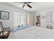 Bright bedroom with a queen bed and built-in wardrobe at 6287 Bahia Del Mar Cir # 208, St Petersburg, FL 33715