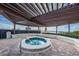 Relaxing hot tub with waterfront views under a pergola at 6287 Bahia Del Mar Cir # 208, St Petersburg, FL 33715